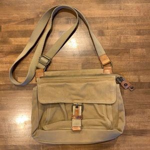 Fossil crossbody bag microfiber/corduroy with boho style stripes inside.